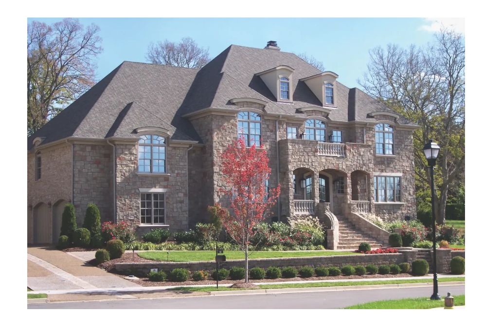 Home with Ashlar stone veneer wainscoting