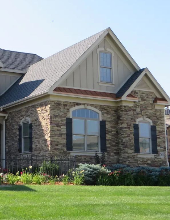 Home with Cutface stone veneer wainscoting